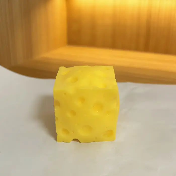 Jouet anti-stress portable en forme de fromage à presser, boule souple à rebond lent pour décoration